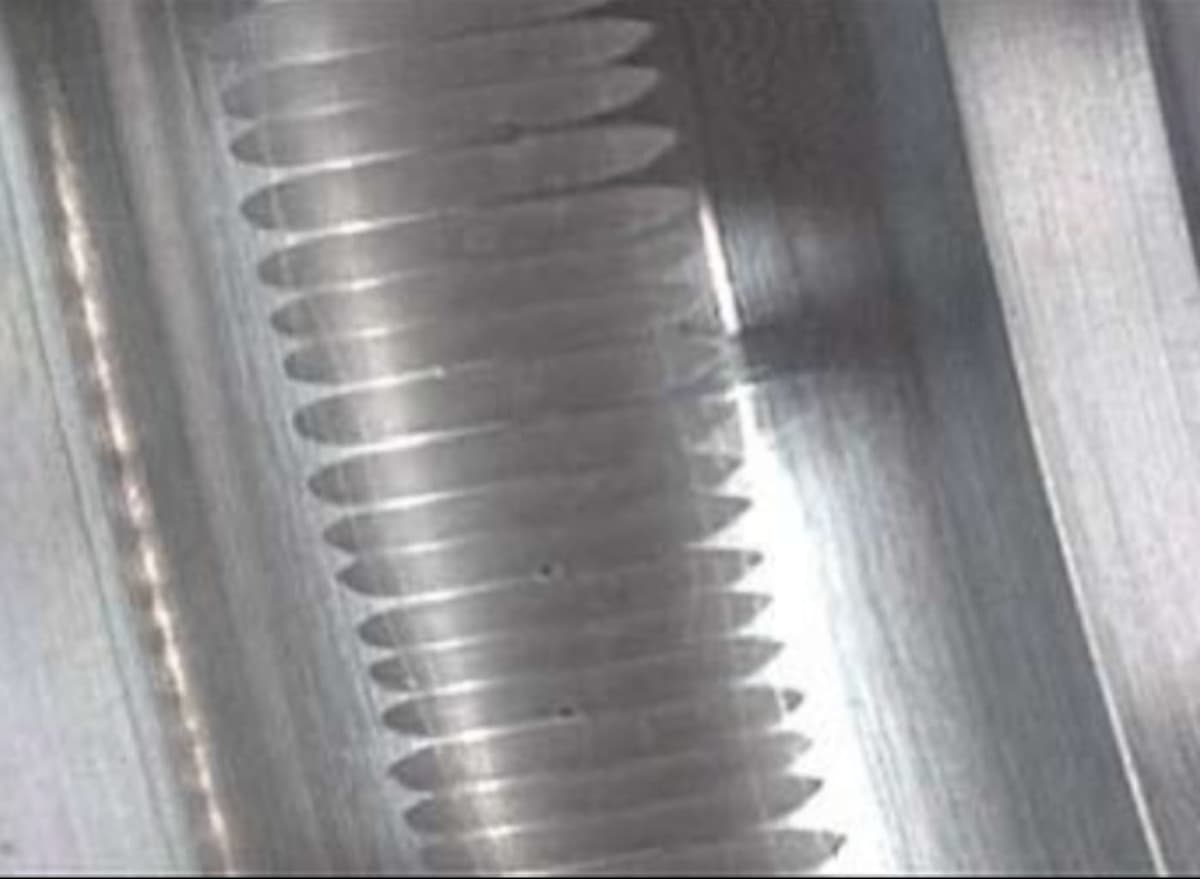 A telltale washboard pattern also called fluting inside the outer raceway of a failed bearing 1400w