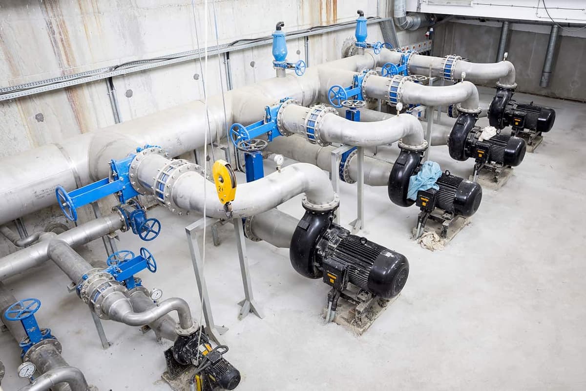 Pump motors and pipework in a wastewater pumping station.