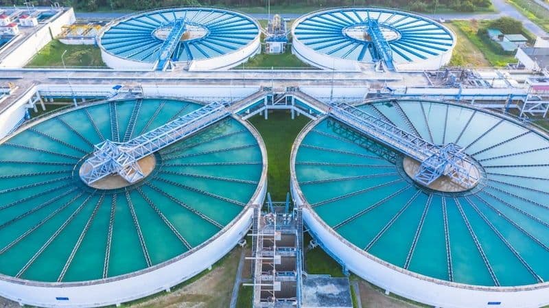Water treatment recirculation solid contact clarifier